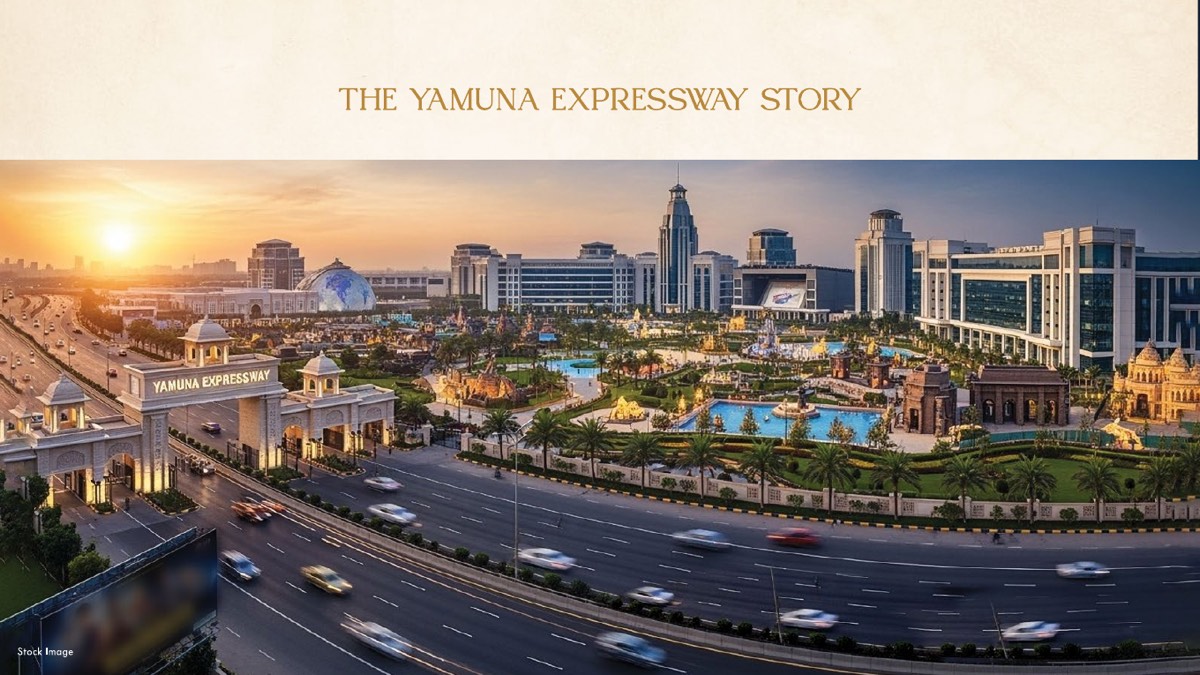The Yamuna Expressway Story — Gaur Alaris developer deck slide showing the Yamuna Expressway gateway and the corridor's landmarks at dusk (stock image as marked on the slide)